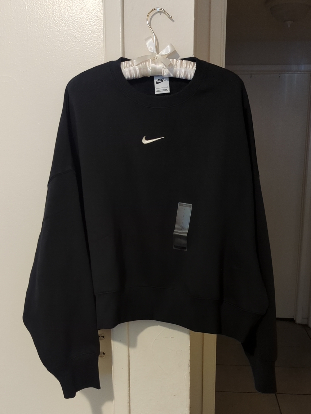Nike Black Sweatshirt with White Swoosh Logo